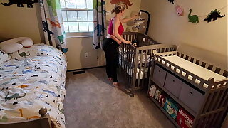 Pregnant Nourisher gets stuck nearly crib and son has to come help her get out
